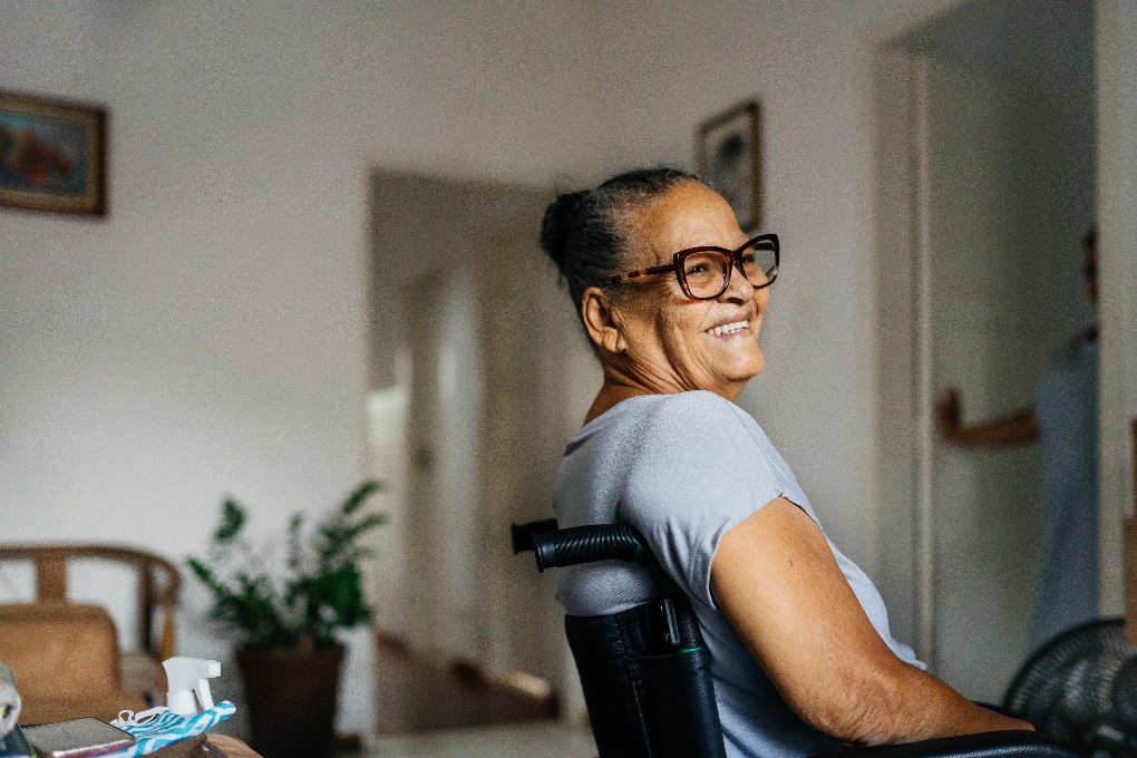 Woman in a wheelchair smiling